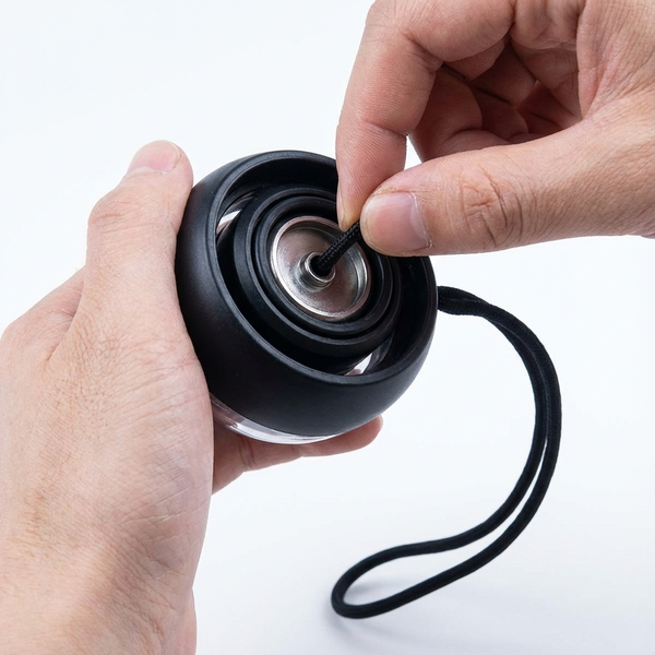 HOW IT WORKS STEP 1 MEDIA - GripBoost Gyro Ball Wrist Trainer